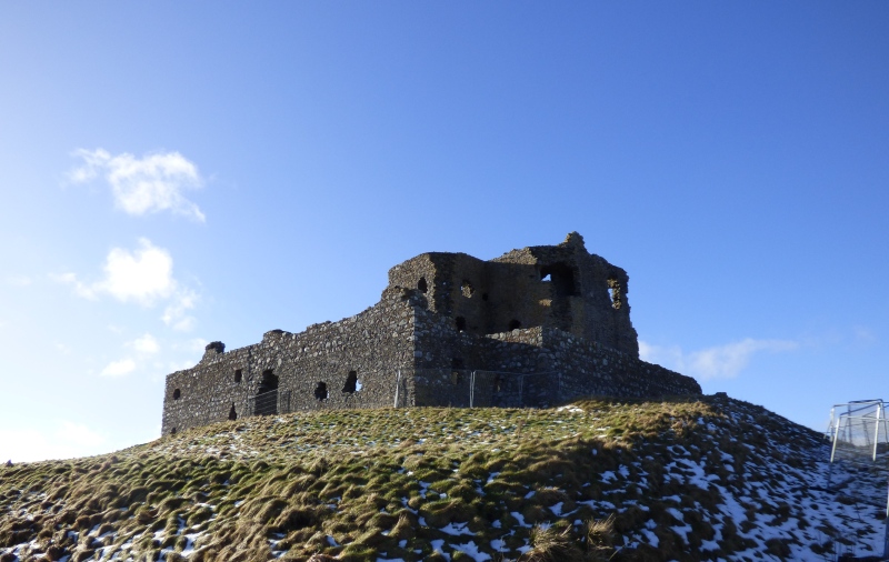 Ruins of Auchindoun Castle with entrance gate visible in curtain wall