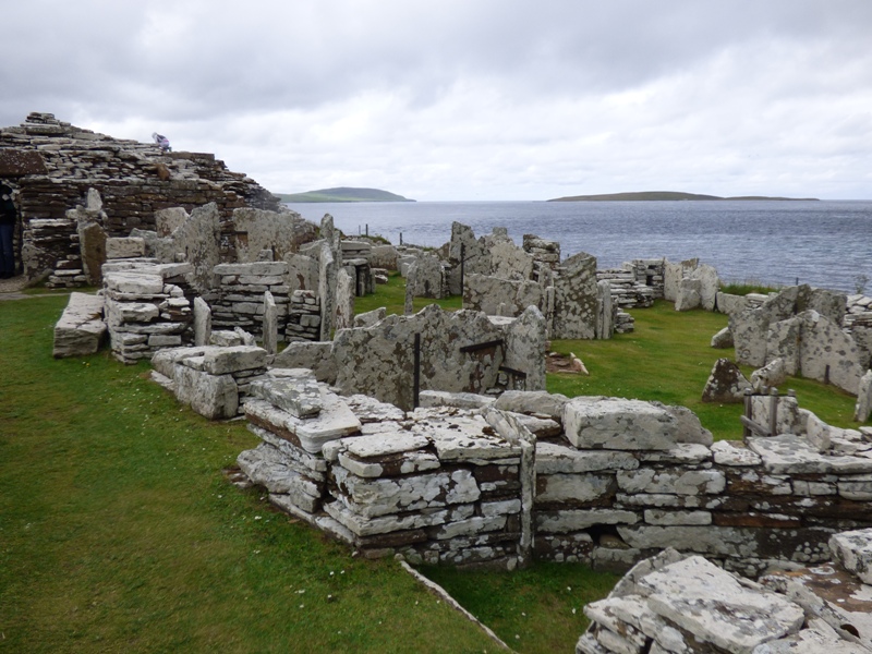 Ruins of the small village of houses clustered around the Broch of Gurness