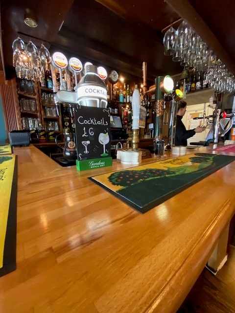 Standing at the bar in the Clachan pub in Dornie