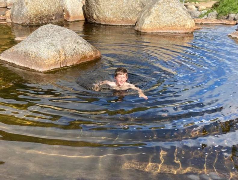 Chilling with a wild swim in Glen Rosa after climbing the Three Beinns