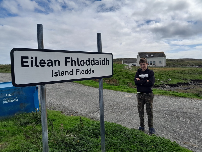 Sign on causeway at the island of Flodda