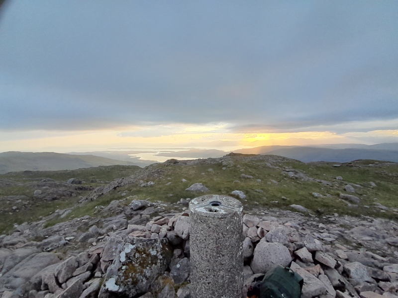 The trig point at the summit of Creach Bheinn