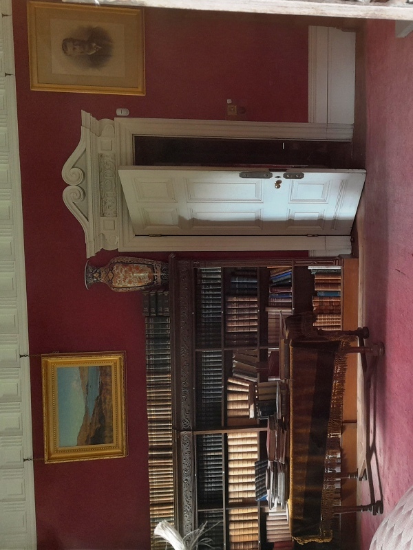 View into abandoned library at Kinloch Caste as viewed through a window