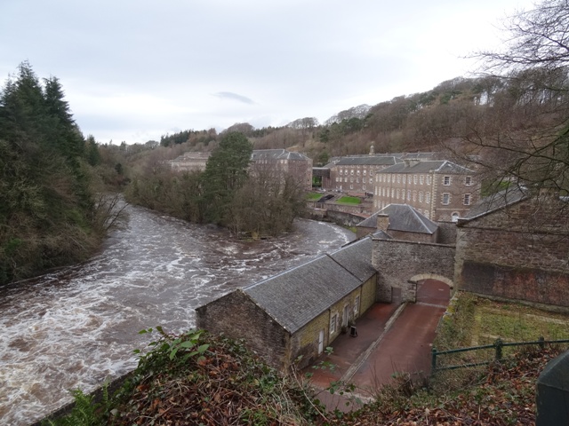 View of New Lanark Mill from banks of River Clyde