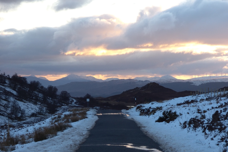 A single track road in Scotland in Winter snow