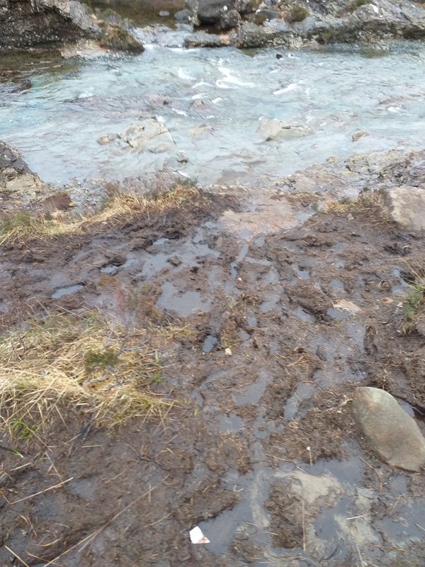 Churned up river bank at Fairy Pools on Skye