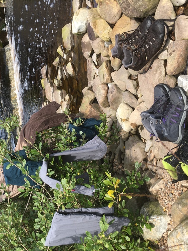 Drying our boots and trousers after falling in a bog on Jura.