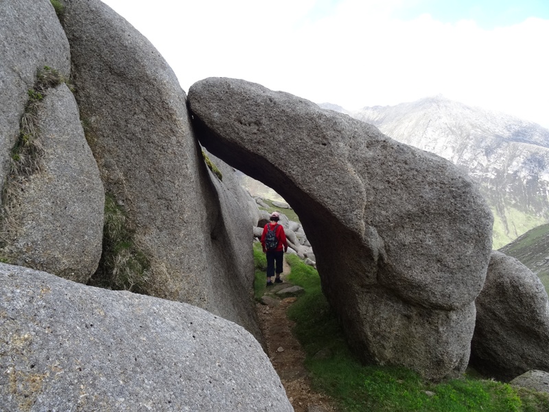 Unusual granite rock formation creating a sheltered path