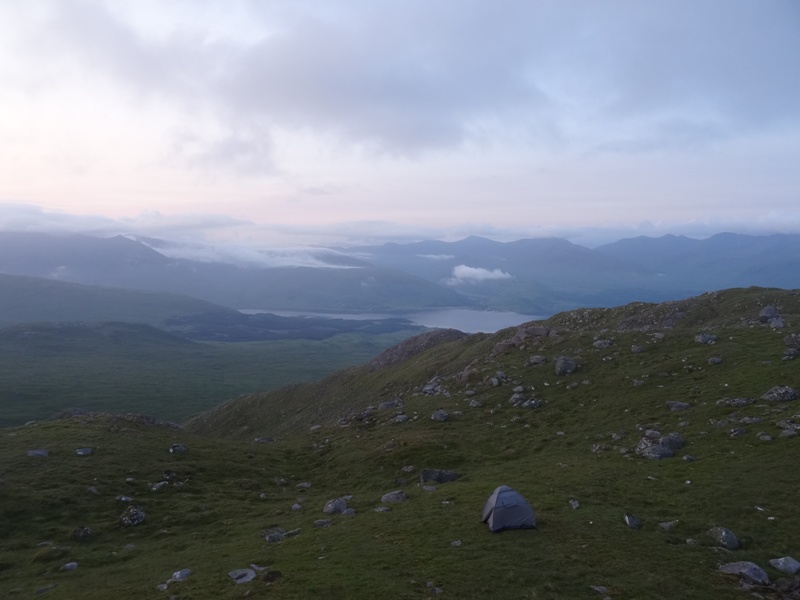Camping in a tent on a Scottish Mountain Camping in a tent on a Scottish Mountain