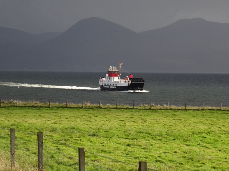Ferry arriving at Claonaig with mixed weather Ferry arriving at Claonaig with mixed weather