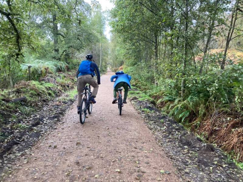 A pair of clowns riding bikes on the Speyside Way